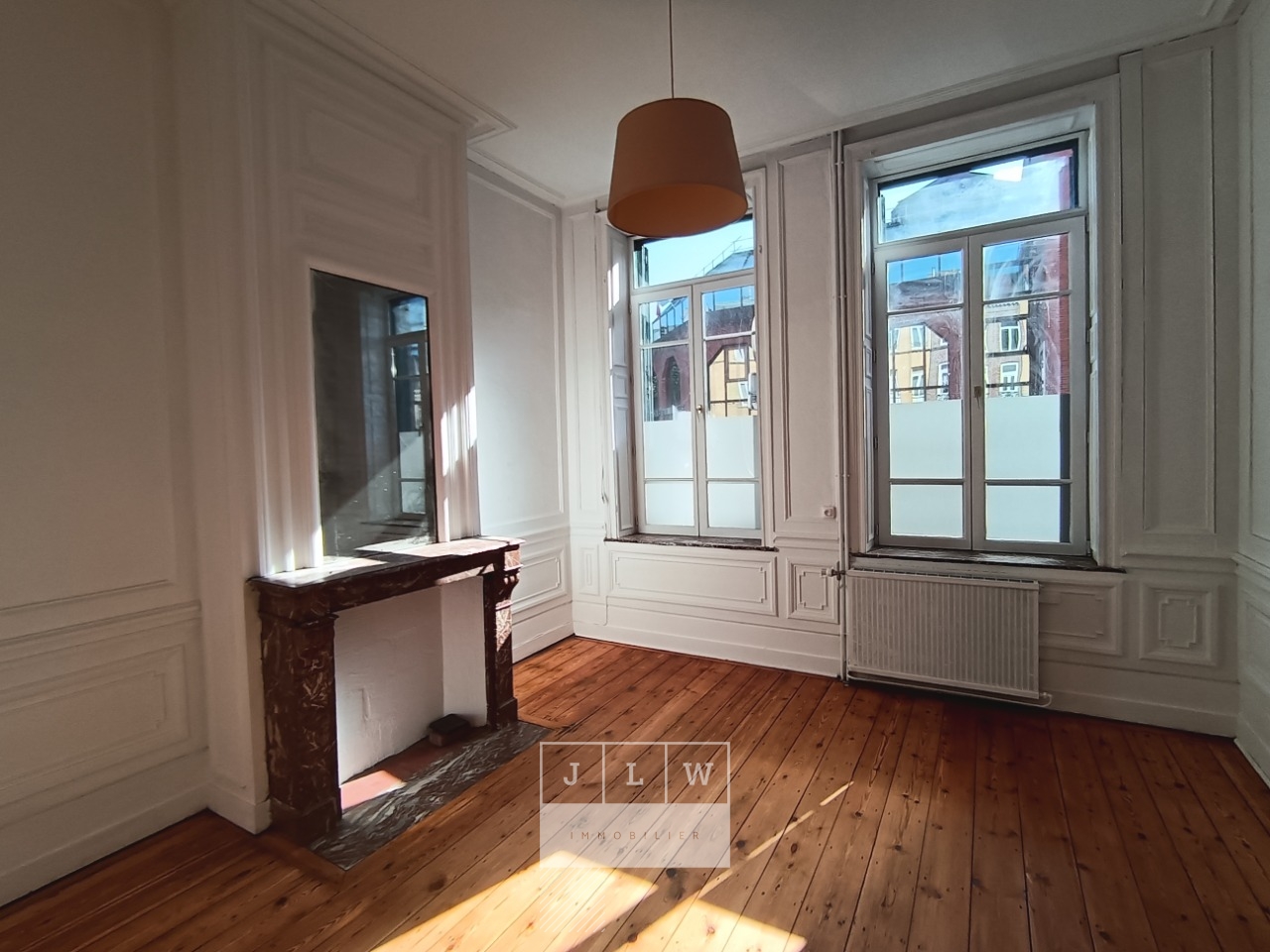 Appartement t2 rdc derriere l eglise st michel lille Photo 1 - JLW Immobilier