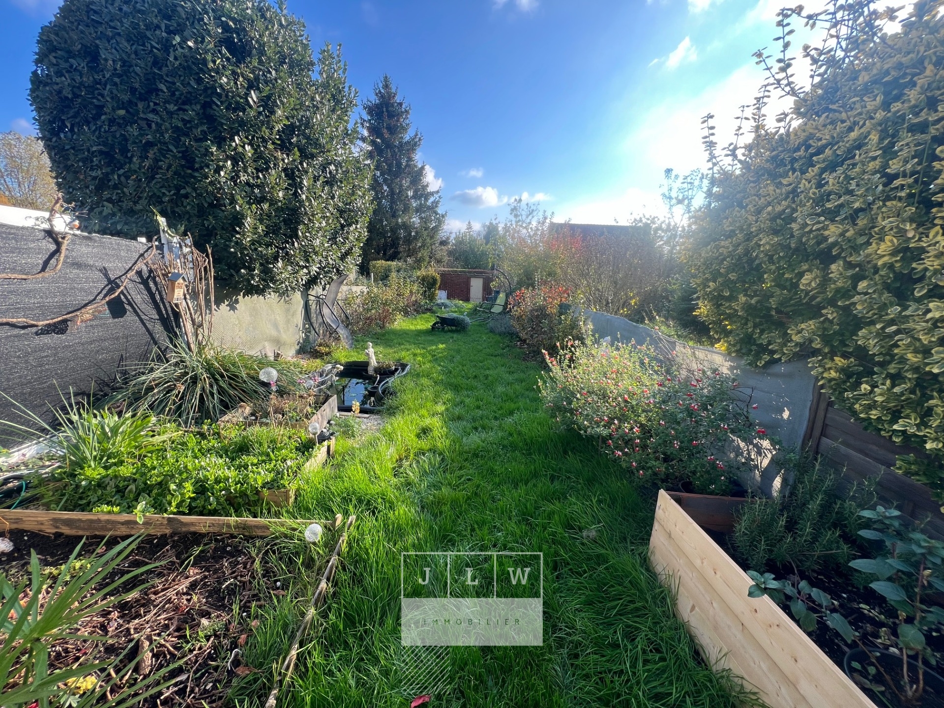 Maison familiale avec jardin cave et poss garage Photo 3 - JLW Immobilier